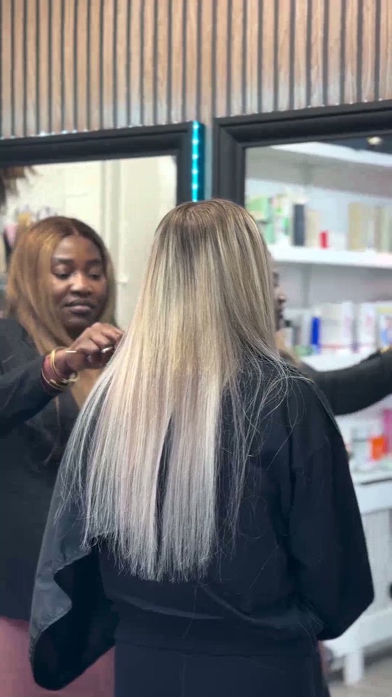 Hair being brushed through after treatment